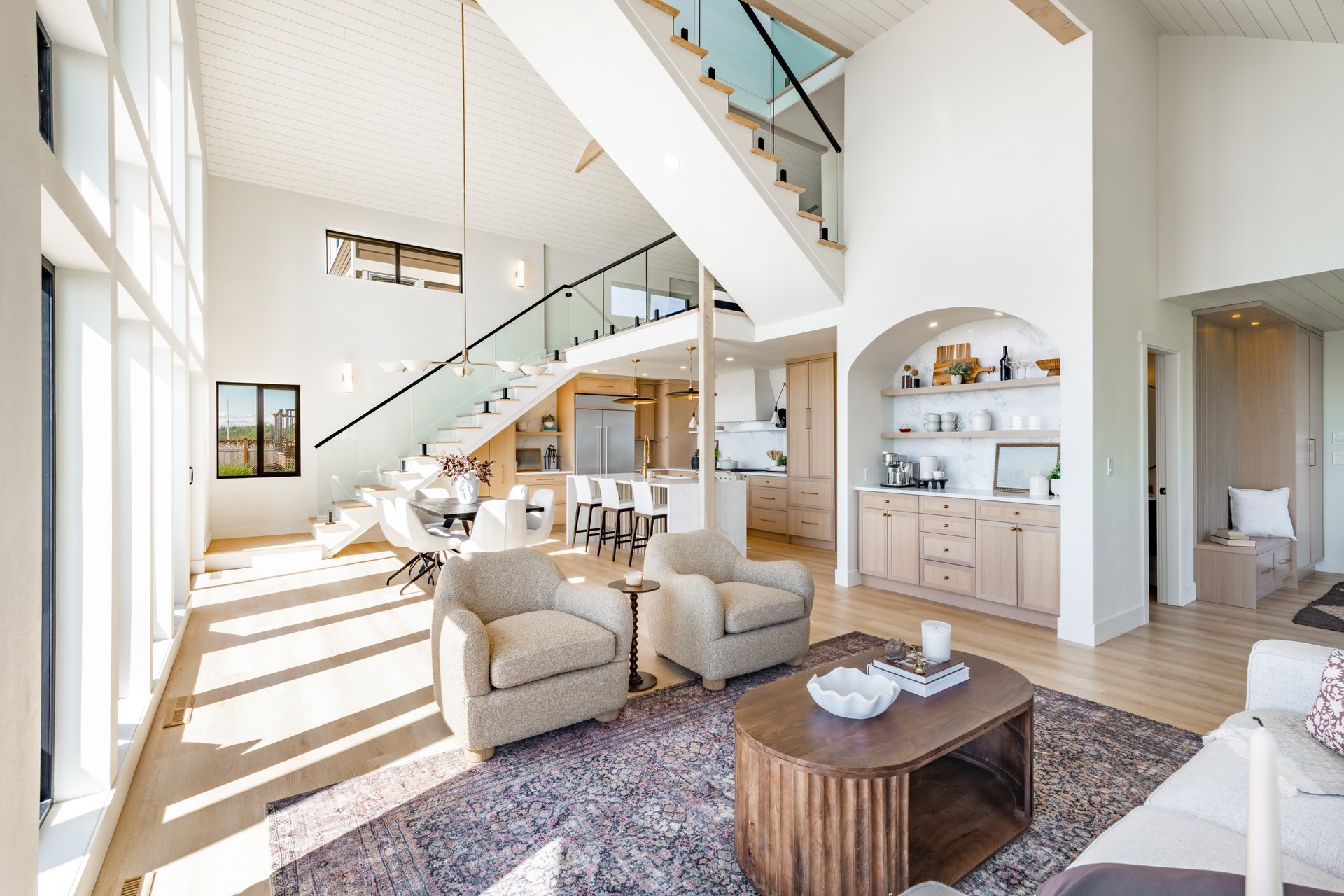 Sophisticated furnished residence with an open modern kitchen, dining and living space