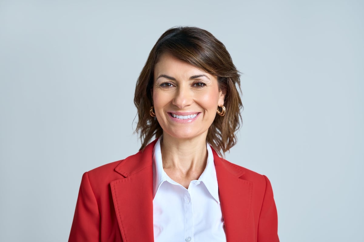 Headshot of a confident businesswoman smiling